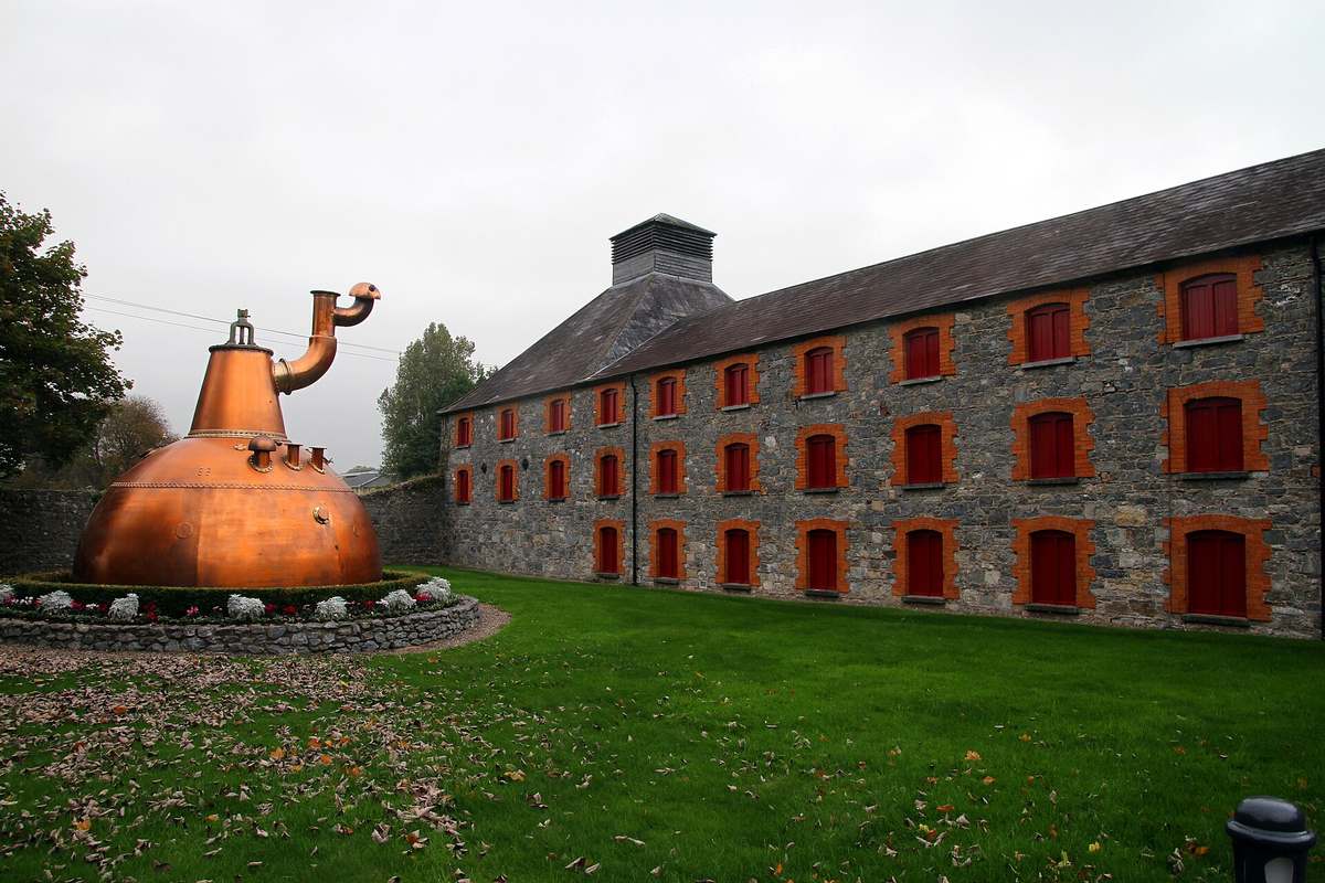 Copper still in front of the Old Midleton Distillery in County Cork, home of Jameson, for our Jameson price Malaysia guide