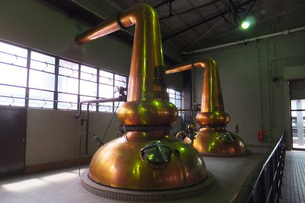 Copper pot stills inside Suntory Yamazaki Distillery, Japan