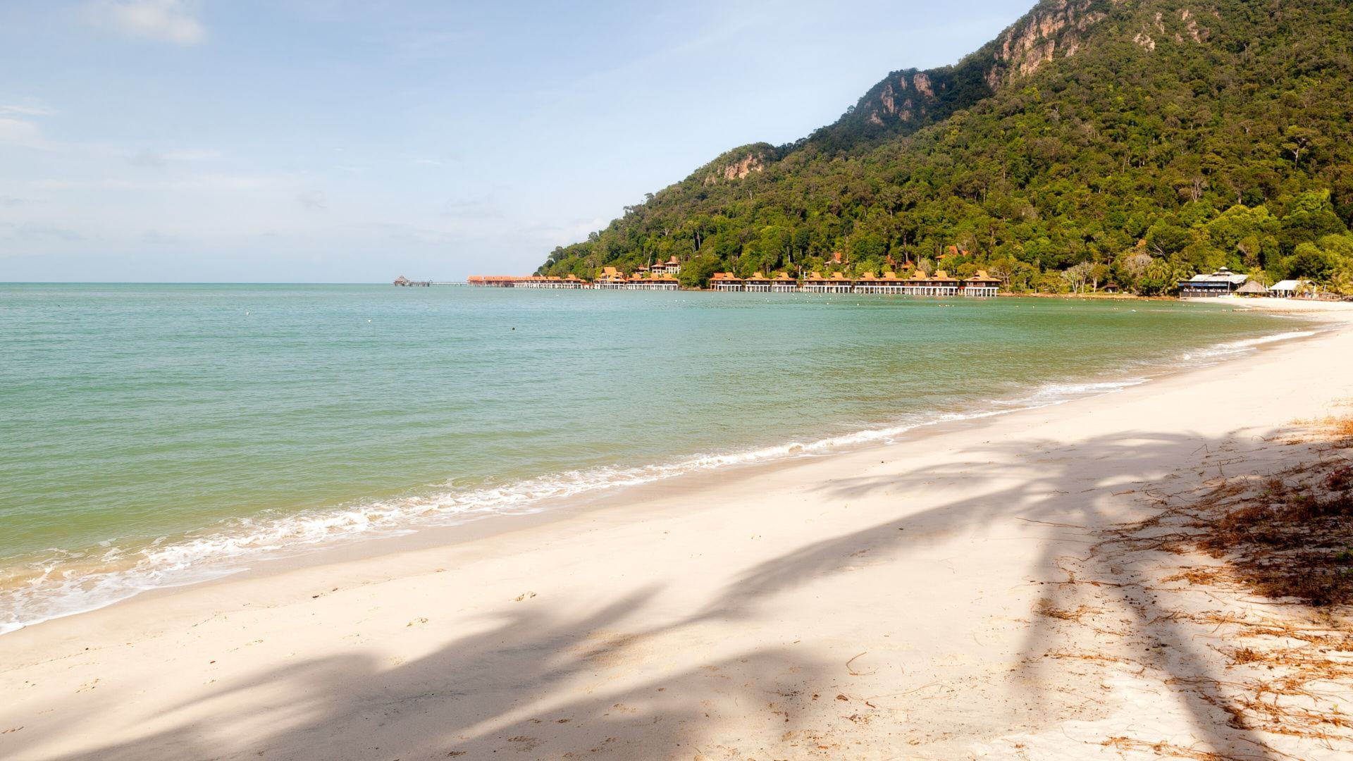 White sand beach and turquoise sea on Langkawi, the island known for Langkawi duty free whisky