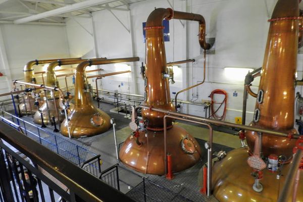 Copper pot stills inside the Talisker distillery on the Isle of Skye, Scotland